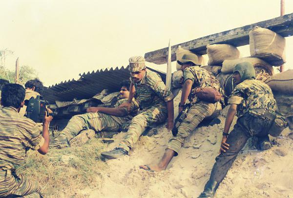 Balraj with Soosai and fellow fighters at a the captured part of EPS base during the first LTTE operation on EPS base ... Aa.Ka.Ve.jpg