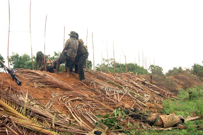 10_12_08_26 5 km west of kili ecovering SLA dead bodies.jpg