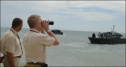 31_05_06_mul SLMM Head viewing the LTTE built naval craft.jpg