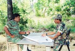 Balraj discussing Iththaavil landing preparations with Sea Tiger Commander Admiral Soosai.jpg