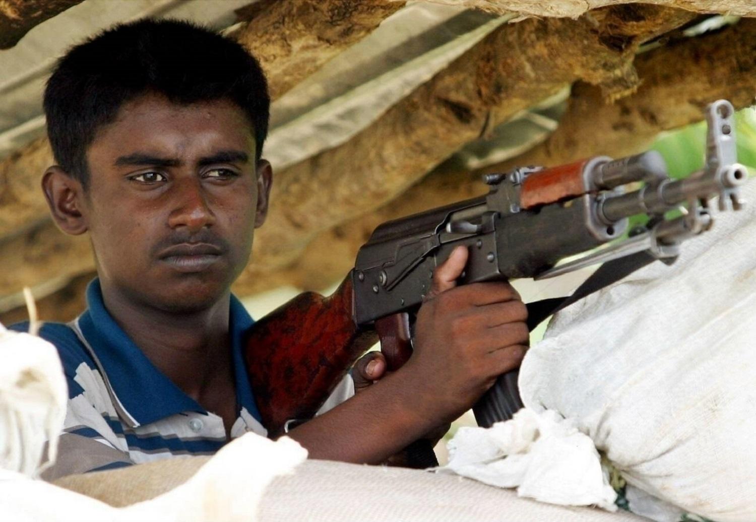 July 7, 2004 - LTTE cadre is guarding from a centry point in batti.jpg