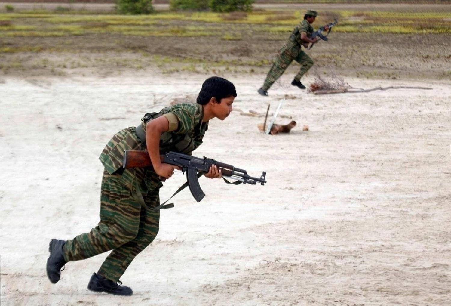 Poonakari regiment's women cadres on july 2007 - tamil tiger women.jpg