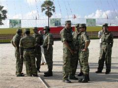 Senior cadres at the Elephantpass memorial site in early morning on Martyr's day.jpg