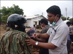 A cadre from LTTE's motorbike brigade being vaccined in the preperation of rescue operation.jpg