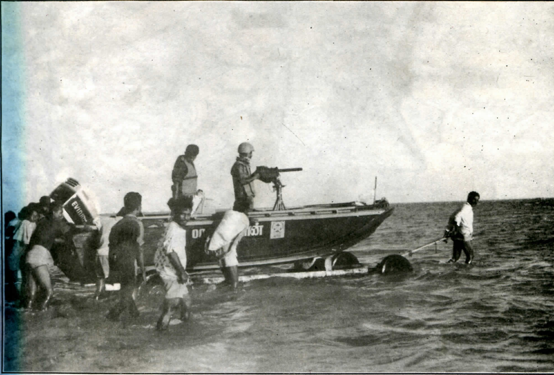Sea tigers kuruvi class boat is being launched into the sea from the boat dock. end 1993.png