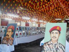 Photographs of 1525 Trincomalee LTTE martyrs including 16 Black Tigers  have been exhibited in the Hindu Cultural Hall, Trincomalee district head of the LTTE Martyrs unit head Mr.K.Thennavan, said. 2003 nov 26.jpg