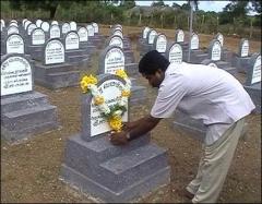 Borks nadukal is garlended by vavuniya political head elilan on 5th july 2003.jpg