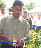 sampoor_policestation_2_081102 LTTE Trinco district commander Uthayan opening the Sampoor police station by cutting the ribbon..jpg
