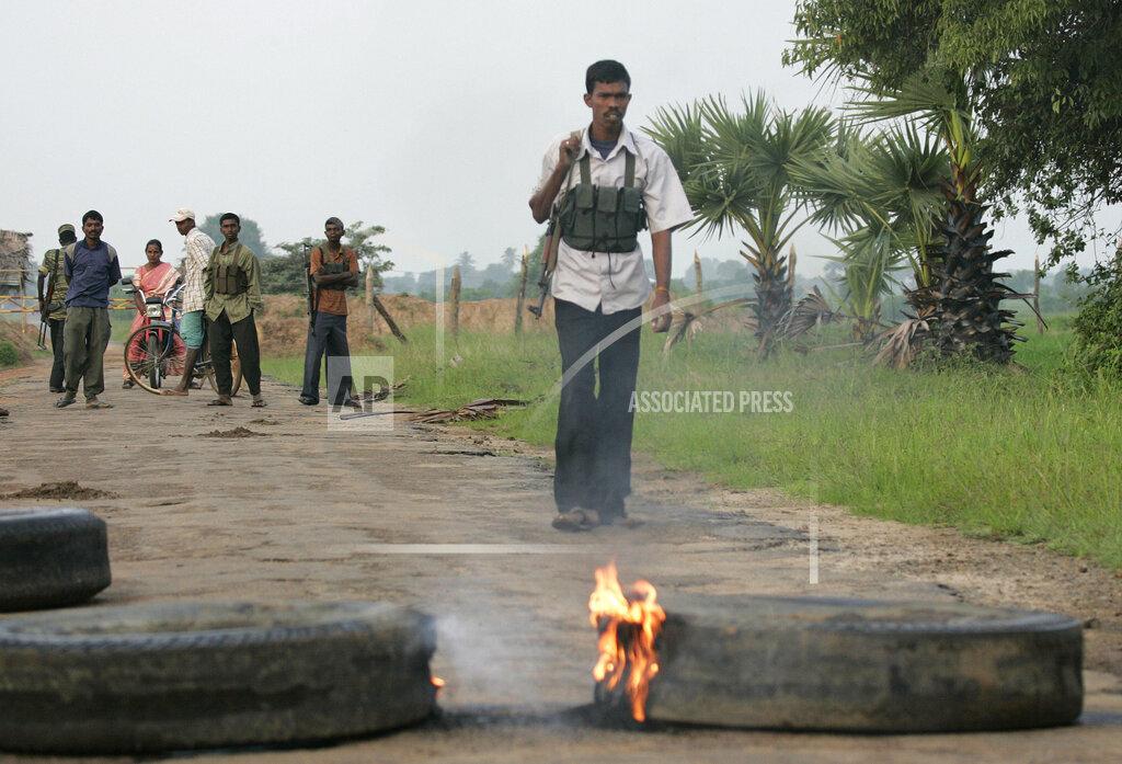 Soldiers of Liberation Tiger of Tamil Ealam or LTTE man a roadblock in Vavunathivu, in Batticaloa district of eastern Sri Lanka, Thursday Nov. 17, 05.jpg