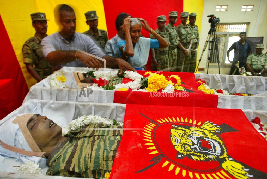 Relatives of Tamil Tiger fighters Arumugam Anandakumar and Sangeethan, foreground,.jpg