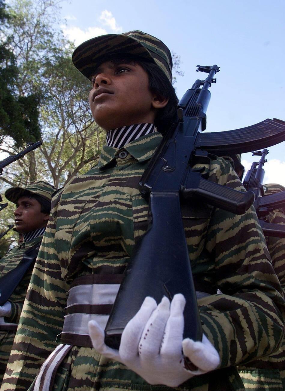 Female tigers of Kuttisri Mortar Brigade march during the womens uprising day on 2002 OCt 10.jpg