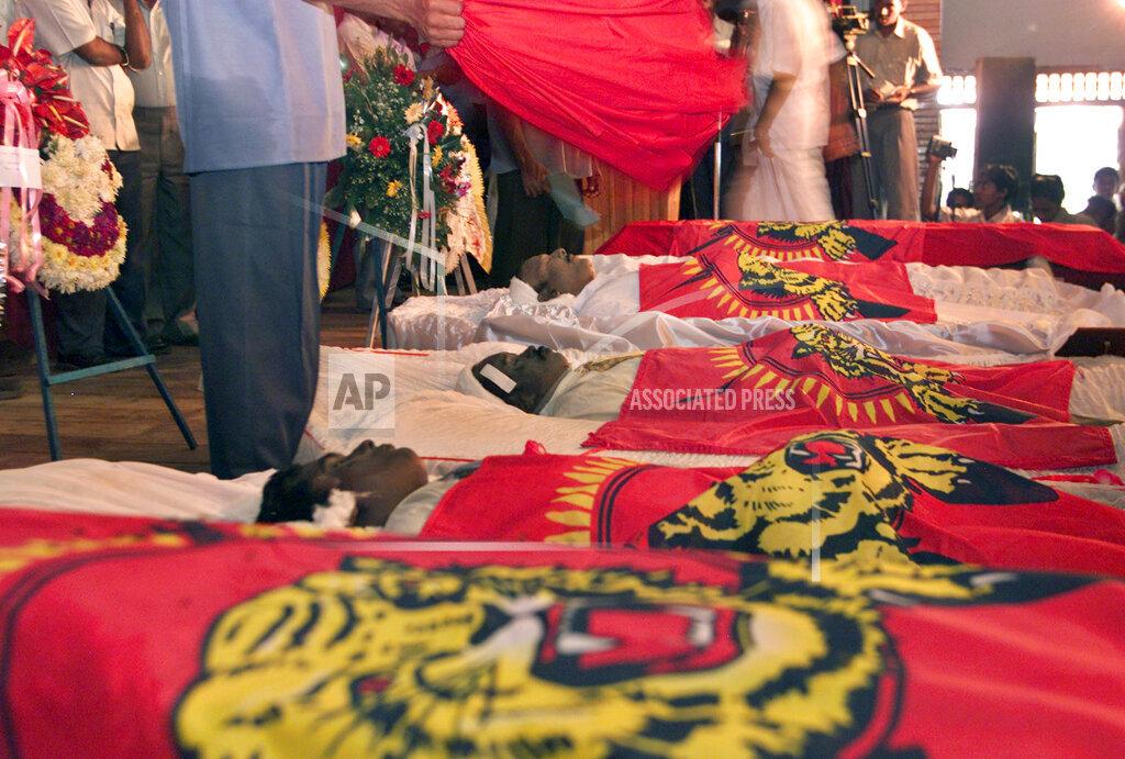 E. Kausalyan and his colleagues, slain in gunfire on Feb. 7, in Thandiyady feb 10, 2005 m.jpg