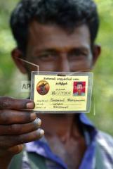 A member of the Tamil rebel's Civil Force' Internal Securuity Force Velusami Krishnabalan displays his rebel identity card, april 22, 2007 | மக்கள் படையின் உள்ளகப் பாதுகாப்புப் படை வீரர்