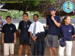 Tamilchelvan with foreign netball team players.jpg