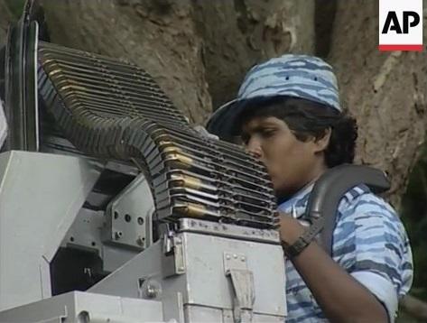 122002 tamil women march past.jpg