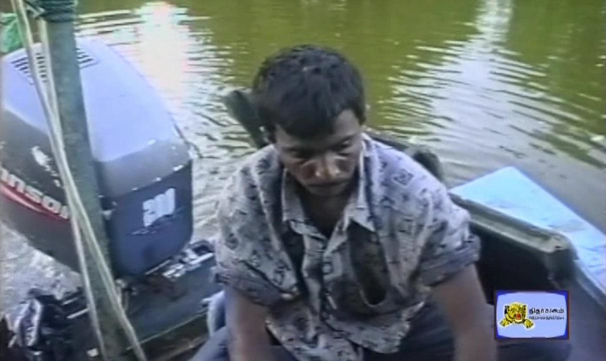 Sea Black Tiger Major Sudarmani alias Sengkathir sitting on the Idiyan class boat.jpg