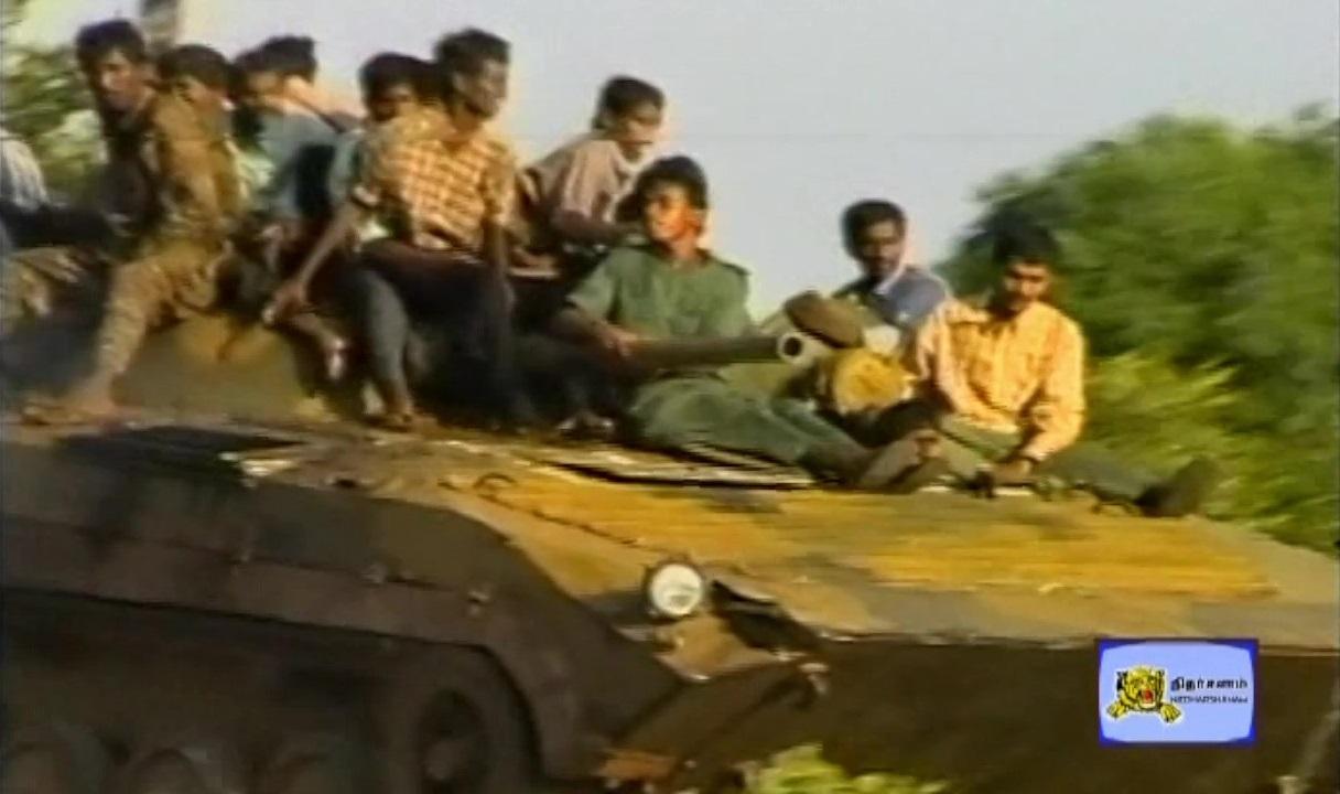 After capturing the BMP-1 in 1997 Tiger fighter having a fun ride on it.jpg
