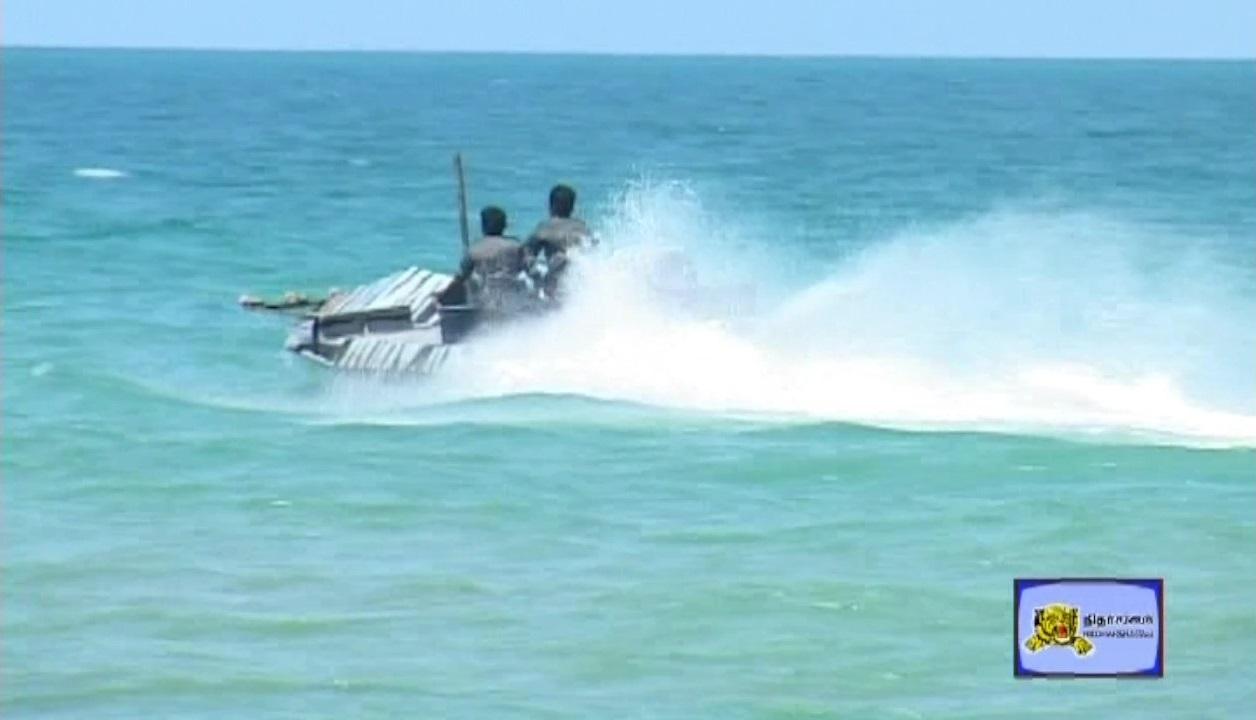 Sea Black Tigers in a Idiyan class boat during a training.jpg