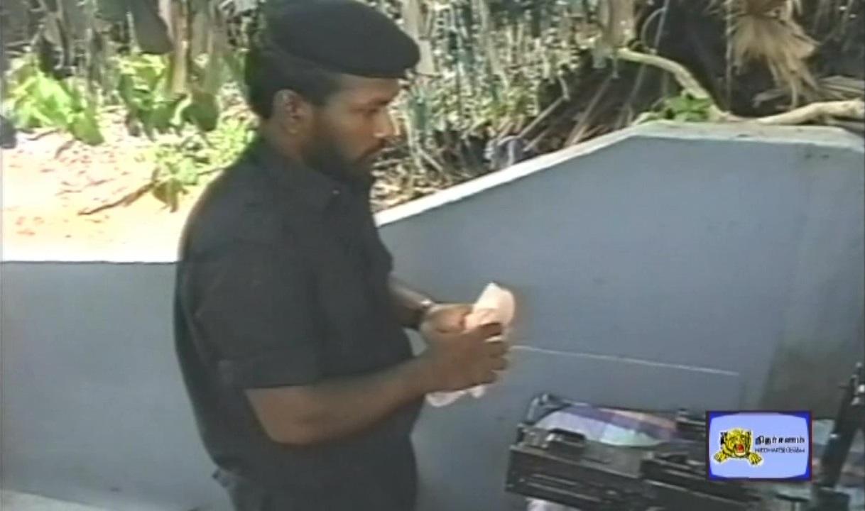 Sea Black Tiger Lt. Col. Salman standing inside the Vellai class boat of Sea Tigers .jpg