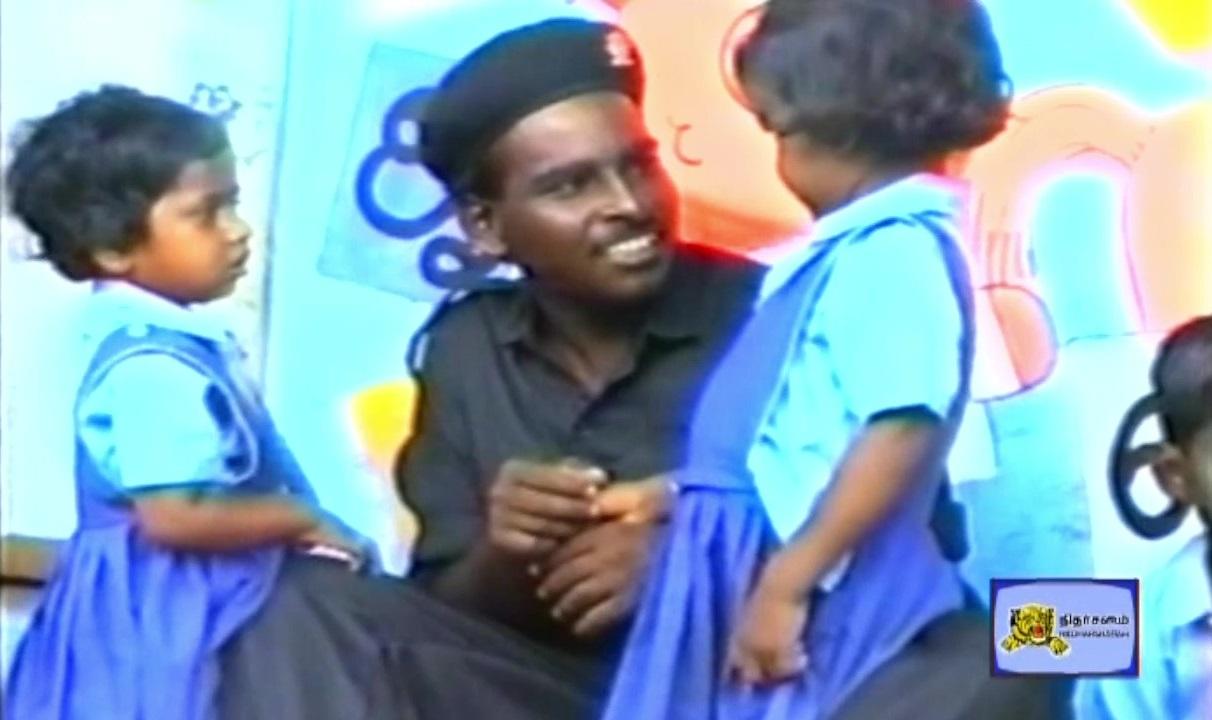 Sea Black Tiger talking with 2 school kids.jpg