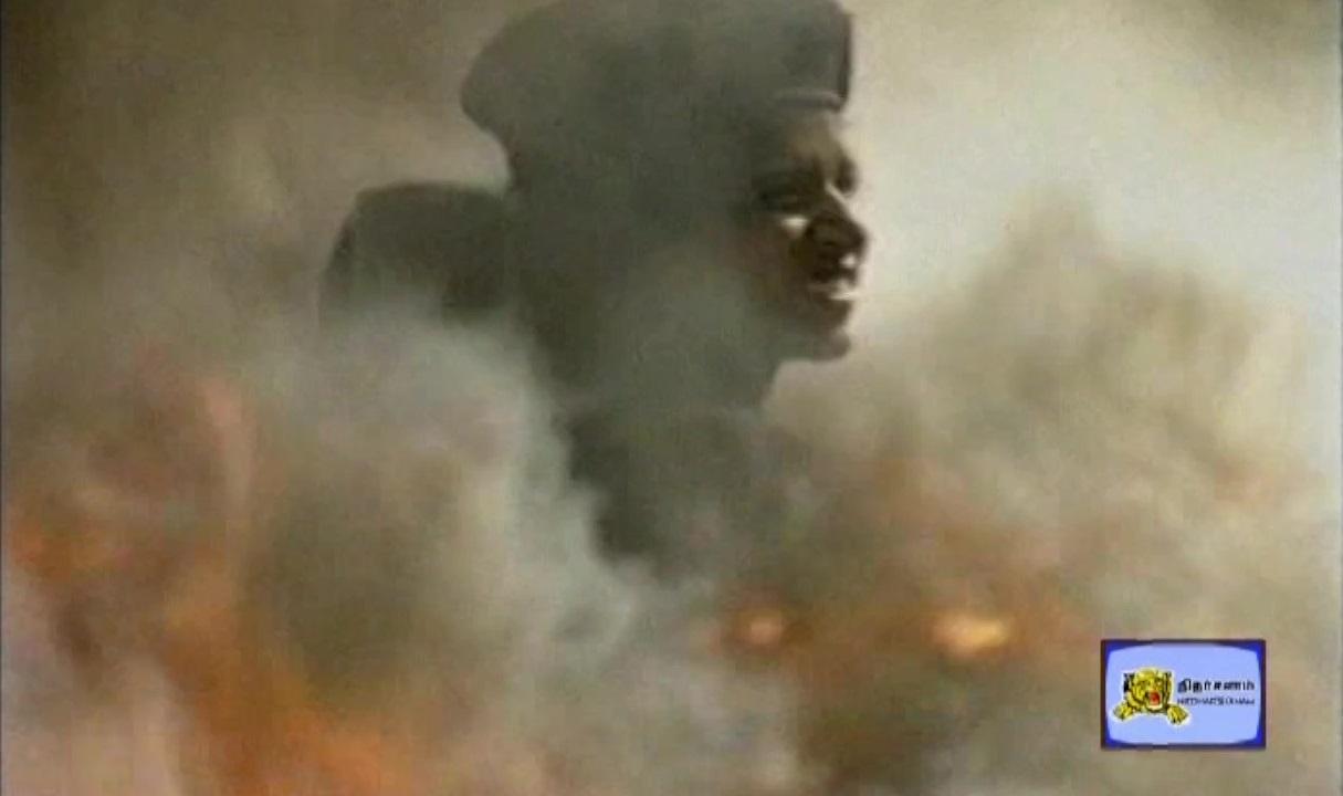 A look of the Female Land Black Tiger through the flames during the LTTE operation the Unceasing Waves 3.jpg