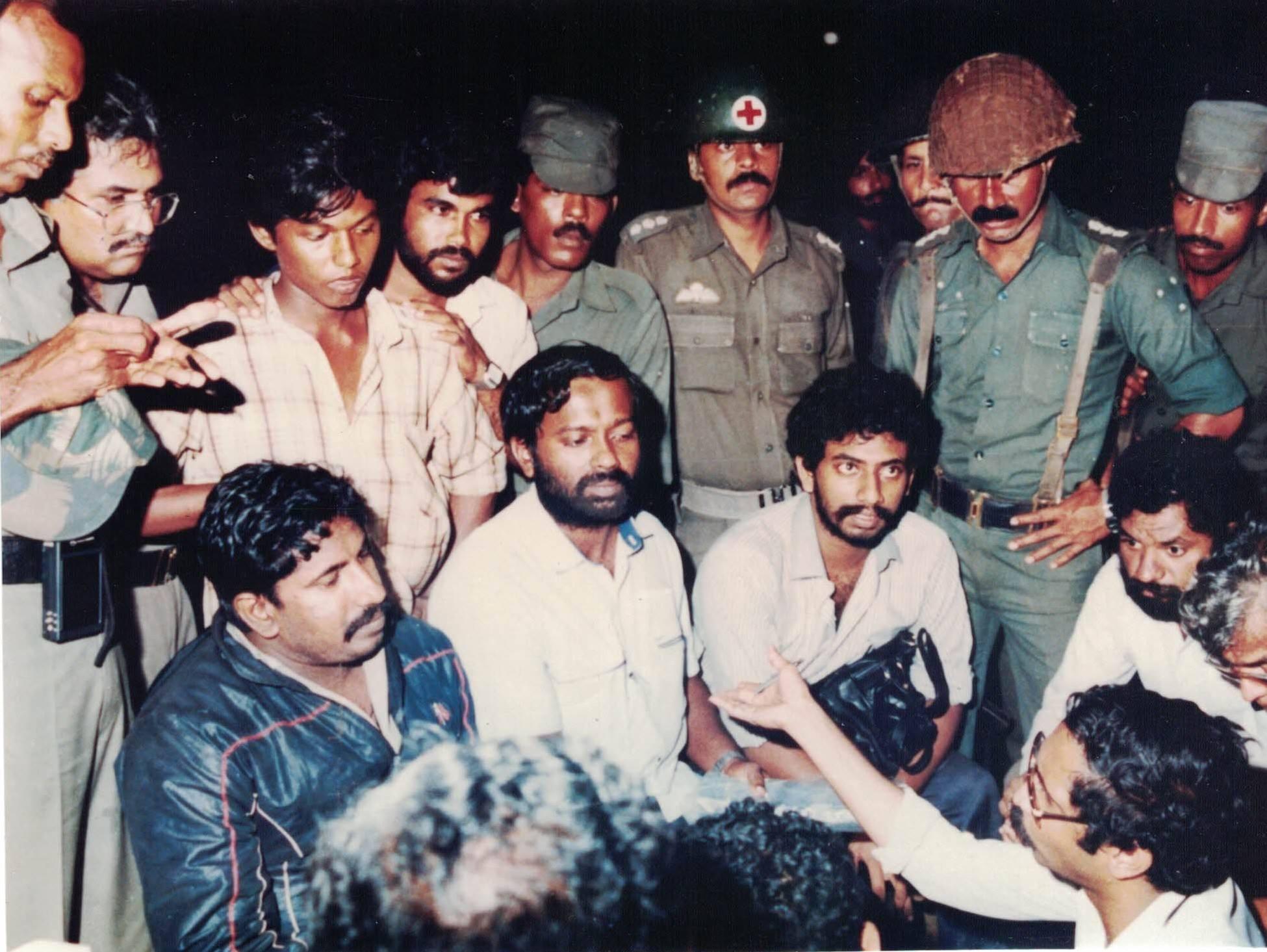 Press meet, soon after the release of Indian Army Prisoners of war ( POWs) – Uduvil, November 1987. with Mahathaya, Shankar, Theepan, T.S. Subramaniam (The Hindu -Frontline) and other Indian journalists).jpg