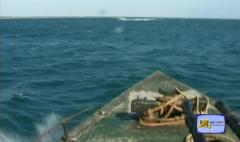 Bow tip of a Wave Rider class gunboat ltte... A ZPU-2_s barrel mouth is seen.jpg