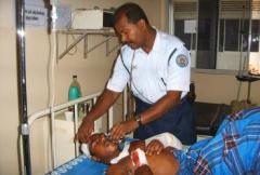 The captured Singhalese soldier being treated by a Tamil Eelam Paramedic on 2006.jpg