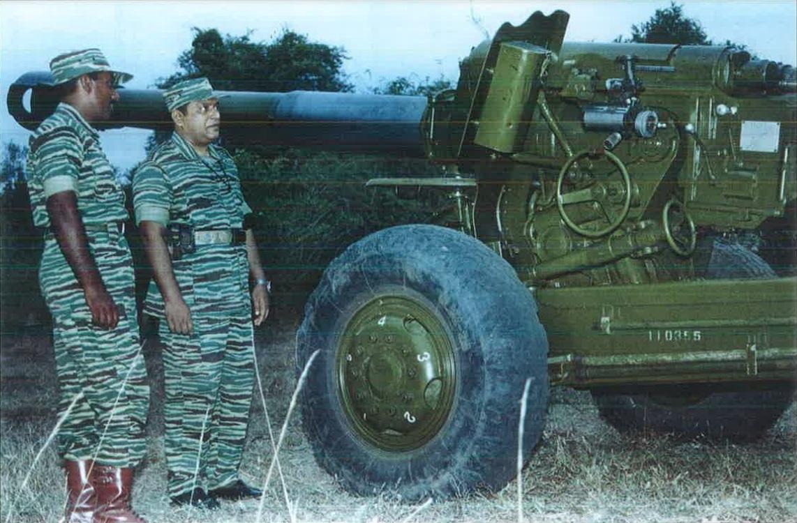 Tamileelam National Leader Mr. Veluppillai Pirabhakaran, inspecting the artillery captured from the fled SLA forces in Elephantpass.jpg