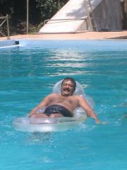 Hon. V. Prabhakaran having fun in the Kalaiyarsan Underwater Swimming Practice Pool