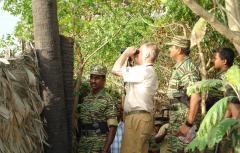 31_05_06_mul_10 Northern Front Forces Commander Lawrance (behind Henricsson) showing the Sri Lanka Army FDL from LTTE FDL near Muhamalai.jpg