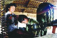 LTTE women cadres, Palai 2006 bunker.jpg