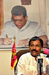 S.P. Thamilselvan, the political head of the Liberation Tigers of Tamil Eelam (LTTE), speaks to journalists at the LTTE Peace Secretariat's Office in the rebel-controlled town of Kilinochchi, Sri Lanka, Monday, May 3, 2004.jpg