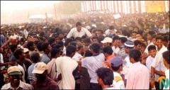 Mr. Ilamparuthi (Ancheneyar), the head of the LTTE's political wing for the Jaffna district, being caried aloft by the crowds..jpg