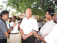 SLMM acting head in Trincomalee Mr.Kurt Spur talking to media personnel at the Kurankupanchhan LTTE camp site.jpg