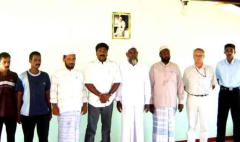 The released two home guards (extreme left) are seen with Muslim religious leaders, Mr.Elilan, SLMM Trincomalee head Mr.Ove Jansen..jpg