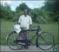 Nakamany Kandasamy, 48, on his way to Udumbankulam at dusk..jpg