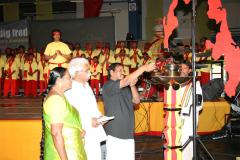 Poets Pulamaippiththan and Arivumathy from TamilNadu, India, lighting the common flame in the beginning of the event..jpg