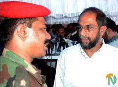 exchange_pow_280902_3 SLA's captain Ajith Boyagoda speaking to an SLA officer after his release.jpg