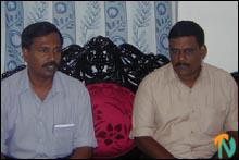 ltte_muslim_meet_130702 LTTE leading member Mr.Tilak with Rajesh addressing Muslim leaders.jpg