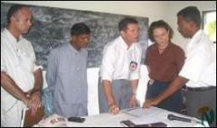 pow_released_2_021002 LTTE Trincomalee district political head Mr.Tilak finalises the handing over of he SLA soldier with ICRC Trincomalee head Ms Lina Milner, SLMM head Mr.Abdul Burkhan, ICRC official Mr.Duncan Bond..jpg