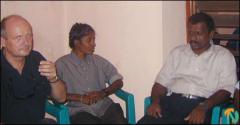 Dr. Geinitz is seen with the LTTE district political administrative secretary Mr.Iynkaran and women wing leader Krishna.jpg