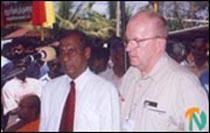 Mr. Sivasakthi Anandan, Tamil National Allaince MP for Vavuniya (EPRLF) lighting the lamp at the opening ceremony of the LTTE's political office in Vavuniya (left) and the SLMM member for Vavuniya addressing the opening ceremony..jpg