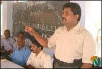 Mr. Soosai, the commander of the Sea Tigers, addressing the gathering at the Maruthankerni Hindu School, Thursday, 19 September 2002..jpg