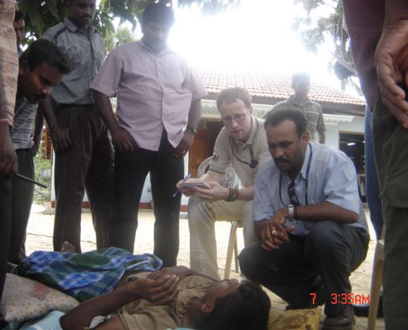 07_10_06_vaharai_08 SLMM, ICRC officials talking to Sri Lankan Gemunu Watch soldier captured by the Tigers.jpg