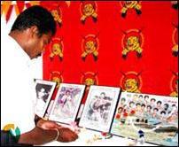 death_anniversary_gopalapuram_070203 Sole survivor in the sea mishap Mr.Thooyavan who is the LTTE political head in Nilaveli area is seen lighting the flame of sacrifice..jpg