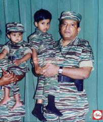 ltte leader with some kids wearing tiger kid uniform... but these are not tiger soldiers.jpg