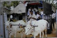 mullai_290303_1 V. Illankumaran cutting ribbon inaugurating the new transport service.jpg