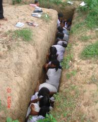 tamil school childred in bunker due to the fear of Sri Lankan Sinhala air force bombing.jpg